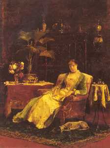 a lady seated in an elegant interior