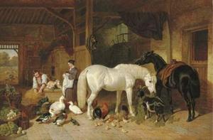 A barn interior with figures and livestock