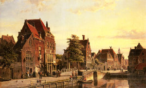 Figures by a canal in a dutch town