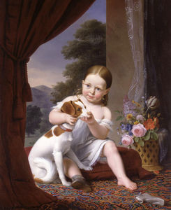 A young girl seated with her dog