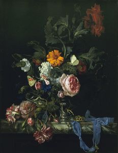 Flower still life with a watch.