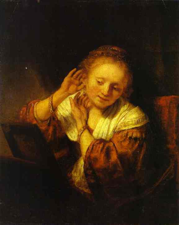 Wikioo.org - Bách khoa toàn thư về mỹ thuật - Vẽ tranh, Tác phẩm nghệ thuật Rembrandt Van Rijn - A Young Woman Trying on Earings