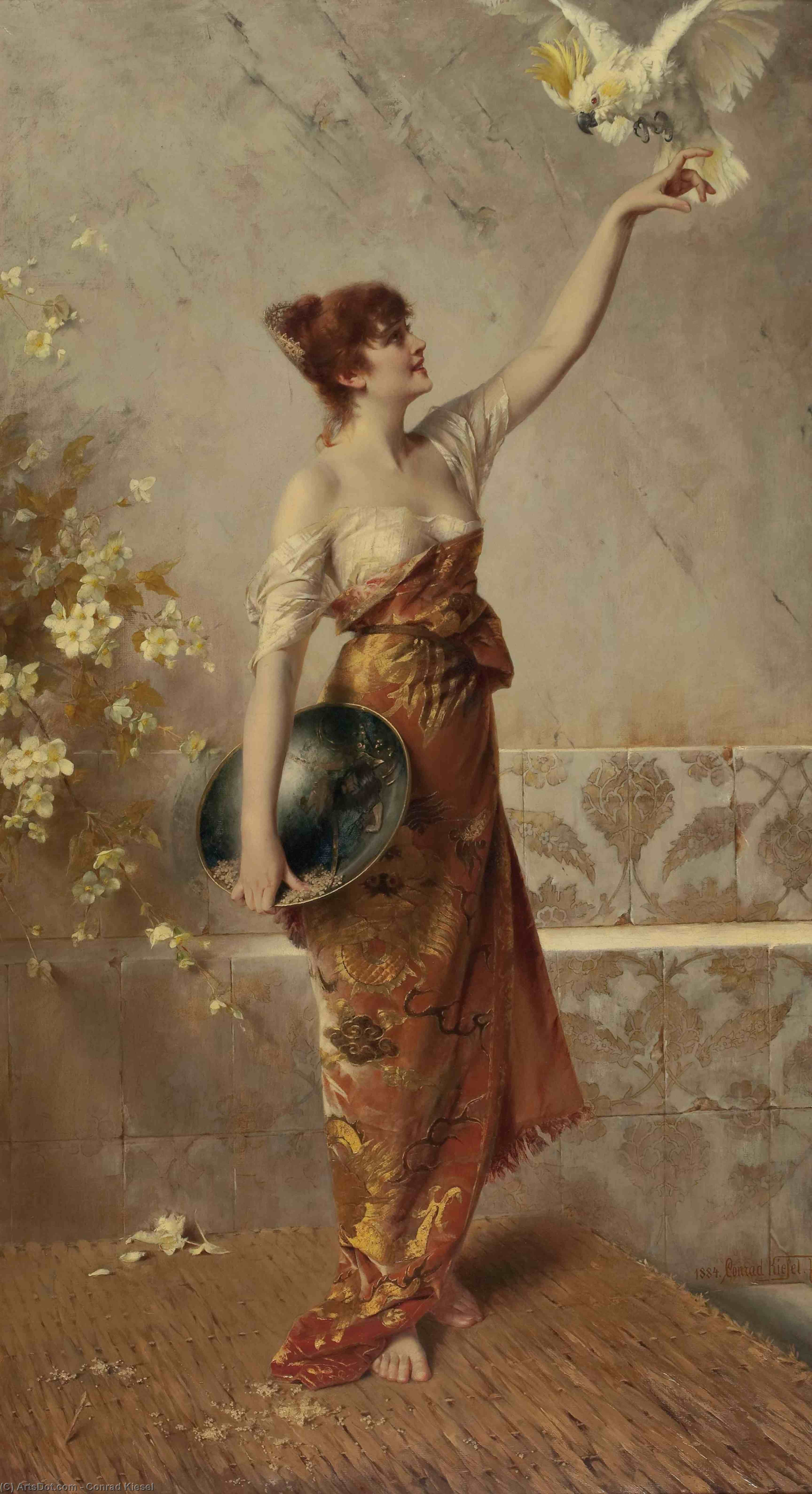 Wikioo.org - The Encyclopedia of Fine Arts - Painting, Artwork by Conrad Kiesel - Manuela. Standing young Spanish woman lures a cockatoo on her hand.