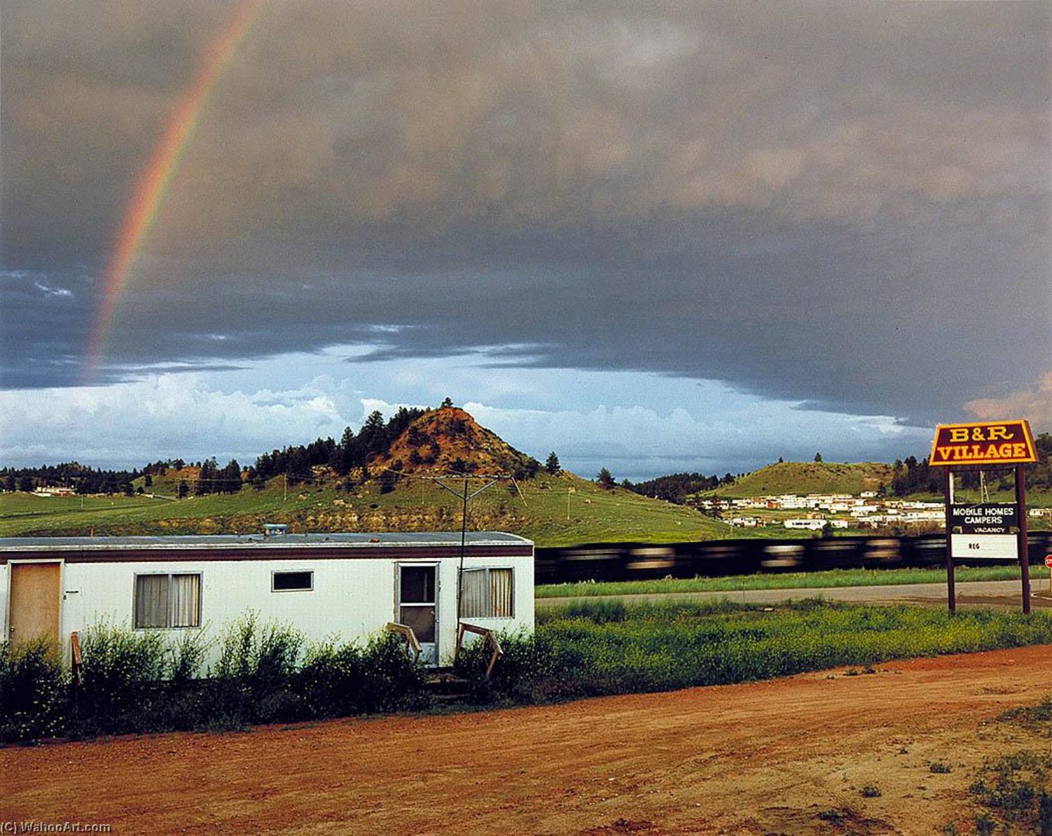 Wikioo.org - The Encyclopedia of Fine Arts - Painting, Artwork by David T Hanson - B and R Village Mobile Home Park and Burlington Northern Coal Train. June 1984, from the series Colstrip, Montana 1982 1985