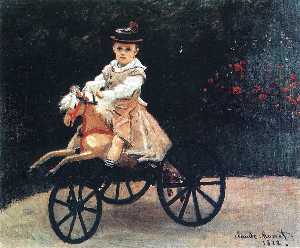 Jean Monet auf einem mechanischen Pferd