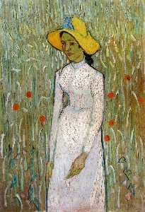 rapariga jovem em pé contra um fundo de trigo