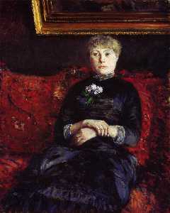 Woman Sitting on a Red-Flowered Sofa 02