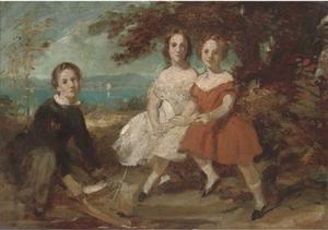 A group portrait of three children