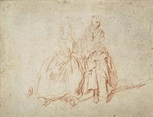 Two women sitting, holding hands