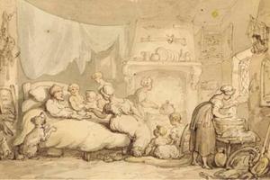 A father in his bed surrounded by his wife and children