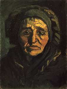 cabeça de uma mulher do camponês com um tampão esverdeado do laço