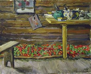 A workshop. Tomatoes on the bench.