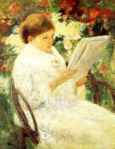 mujer leyendo en un jardín