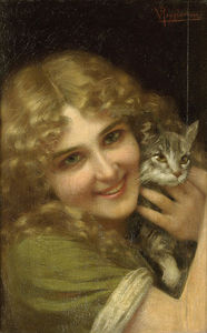  年轻女子  与 a `kitten`