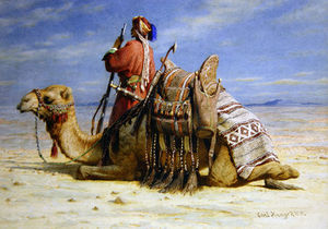A Nomad And His Camel Resting In The Desert