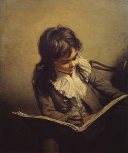 un garçon lisant