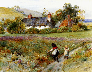 Bambini che giocano su un percorso al di là di cottage