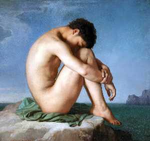 Jeune homme assis au bord de la mer