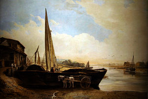 A Thames barge beached for unloading