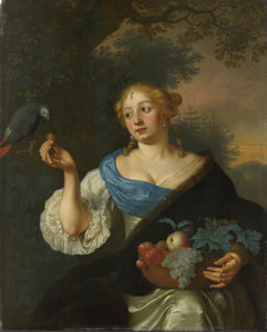 A young woman with a parrot