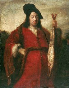 Portrait of a man holding a hare.