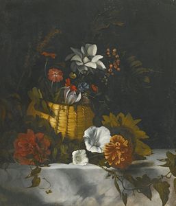 A still life of a basket of flowers on a large marble ledge