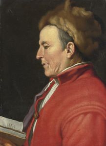 Portrait of a man in a fur hat, reading