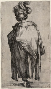 Melchor, visto desde atrás, vestido con un manto adornado con pieles y un sombrero adornado con plumas