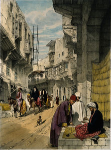 Una escena de la calle en El Cairo con un vendedor ambulante en el trabajo