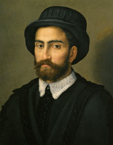 Portrait of a man bust length wearing a black coat and hat