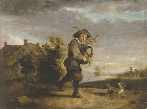 Un suonatore di cornamusa in un paesaggio