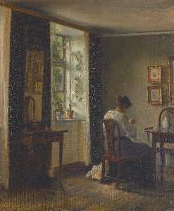 Seamstress sewing in an interior
