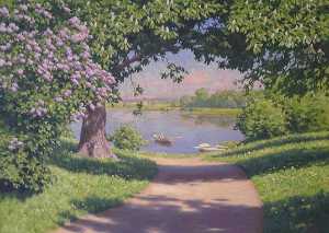 Lake with boat and flowering lilacs