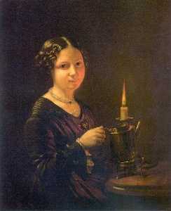 女孩与一个 蜡烛