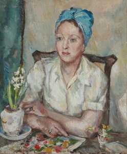 Studio di un donna sconosciuta seduti ad un tavolo con i fiori