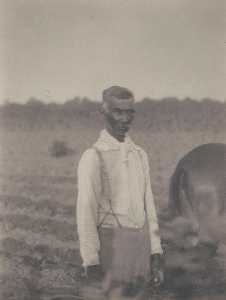 Man in White Shirt in Field