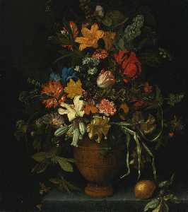 A floral still life with yellow and white lilies, an iris, a sunflower, a narcissus, carnations and other flowers in a terracotta vase, placed on a ledge with a lemon, a lime and a butterfly