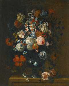 Still life of roses, variegated tulips, peonies, daffodils and other flowers in a sculpted vase