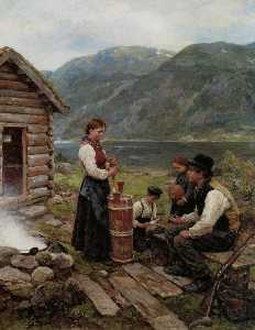 Family in a Norwegian fjord landscape